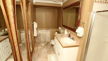 Bathtub, hair dryer, towels