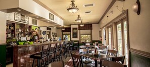 Enjoy a classic bar experience with a variety of beverages, comfortable seating, and a warm atmosphere.