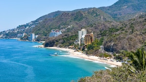 A coastal town with a beach, buildings, and hills. - Private villa- 3 bdrm & 4 bath with ocean views and new private infinity pool  (Puerto Vallarta)