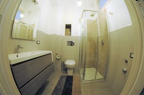 Shower, free toiletries, hair dryer, bathrobes