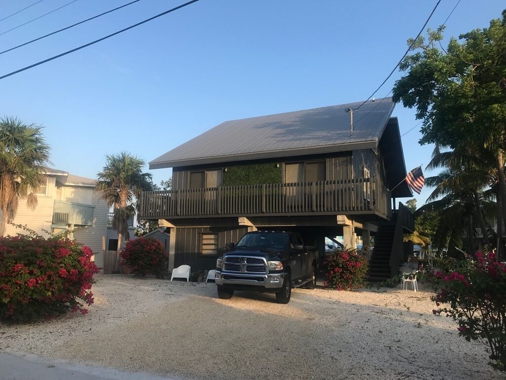 Relax And Get Away To This Prestine Keys Style Home