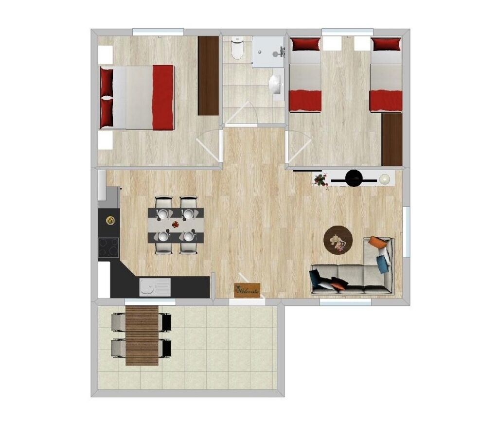 Ein Hotelgrundriss mit Essbereich, Küche, zwei Schlafzimmern und einem Badezimmer.