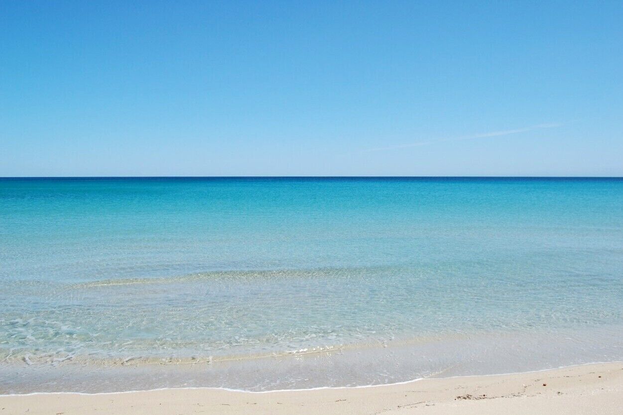 On the beach, sun loungers