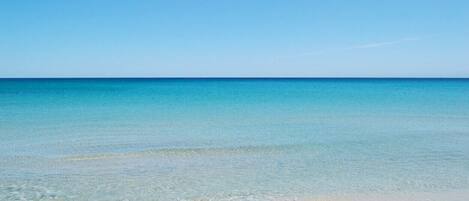 On the beach, sun loungers