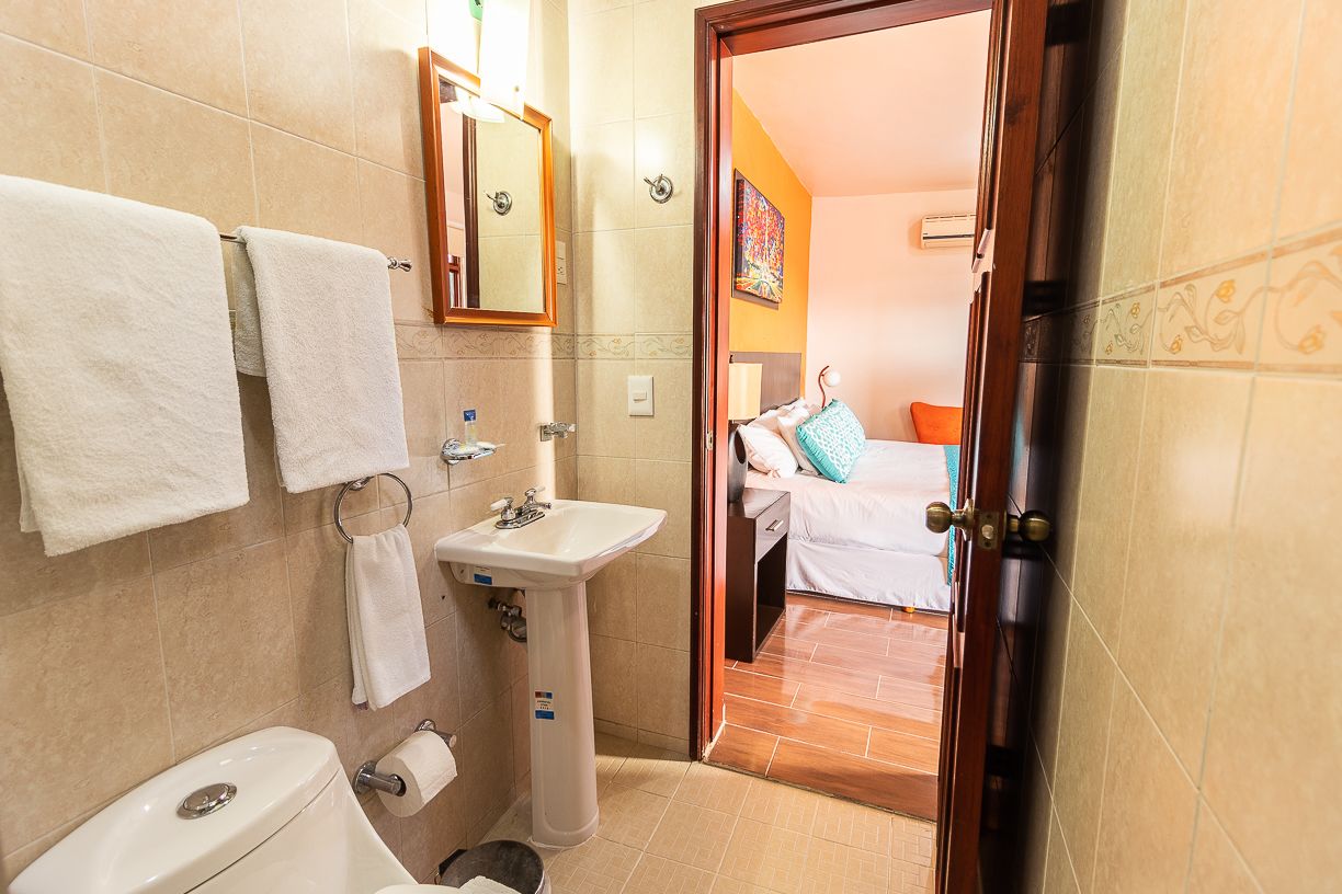 double room single use | bathroom | shower, towels, soap, shampoo