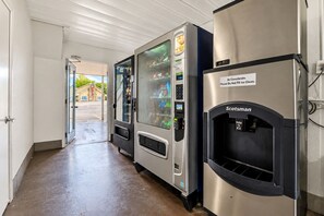 A hallway with vending machines and a Scotchman ice dispenser. - Motel 6 Branson, MO (Branson)
