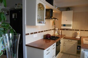 Fridge, microwave, coffee/tea maker, high chair