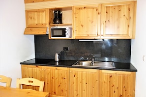 Fridge, microwave, dishwasher, coffee/tea maker