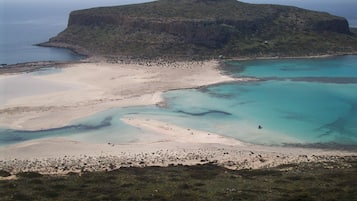 Beach nearby, sun loungers