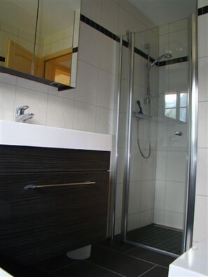 Bathtub, hair dryer, towels