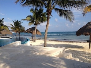 On the beach, sun loungers, beach towels