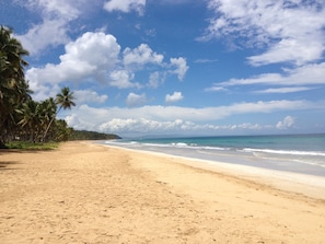 On the beach, sun loungers, beach towels