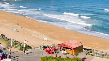 On the beach, sun loungers, beach towels