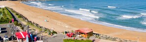 On the beach, sun loungers, beach towels