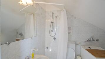 Shower, hair dryer, bidet, towels