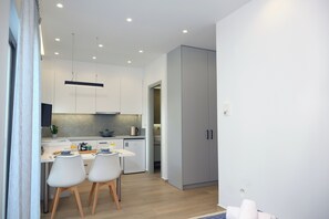 Fridge, coffee/tea maker, cookware/dishes/utensils