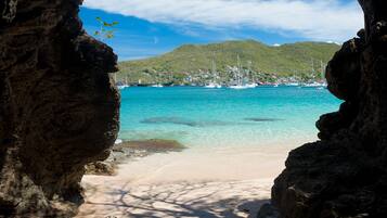 On the beach, sun loungers, beach towels