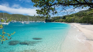 On the beach, sun-loungers, beach towels