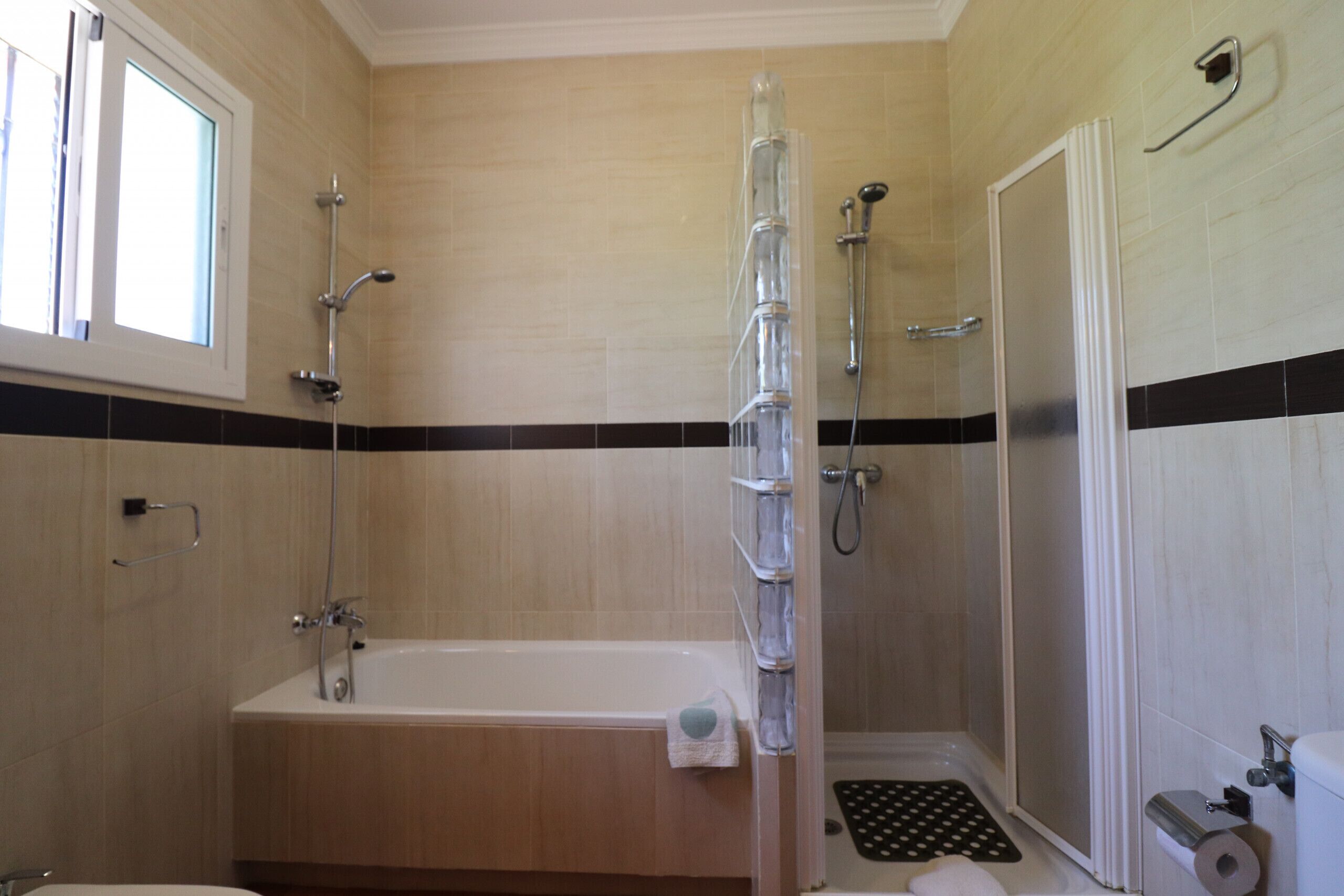 Bathtub, hair dryer, towels
