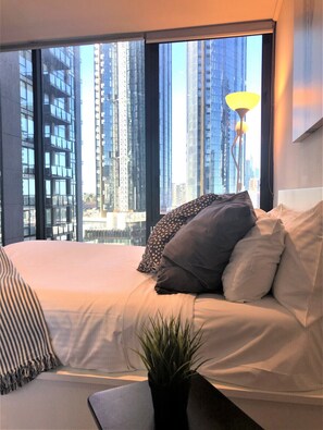 1 bedroom, desk, iron/ironing board, travel crib