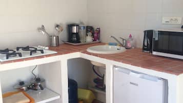 Fridge, microwave, stovetop, coffee/tea maker