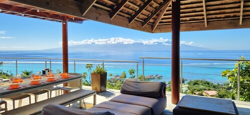 Beautiful architect villa overlooking the lagoon and the island of Tahiti