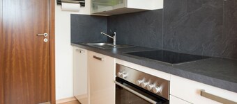 Balcón orientado al sur con vistas lejanas.