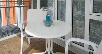 South facing balcony with distant views