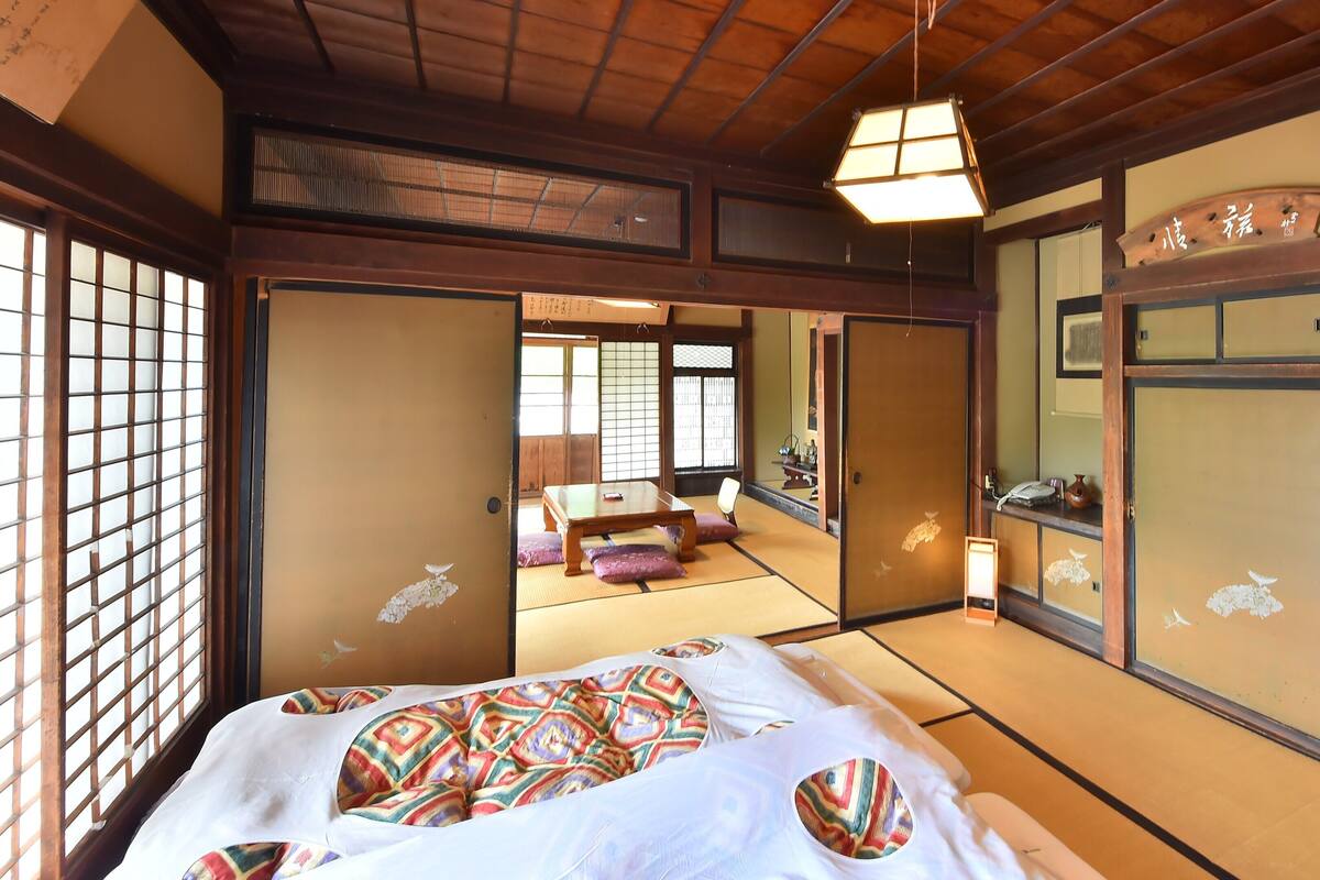 Deluxe Quadruple Room, Non Smoking, Mountain View | Down comforters, WiFi (free), individually decorated