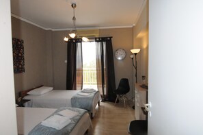 2 habitaciones, tabla de planchar con plancha, internet y ropa de cama 