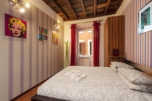 2 chambres, coffres-forts dans les chambres, fer et planche à repasser