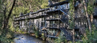 On the bank of the Roaring Fork River  just 4 blocks to the Gondola