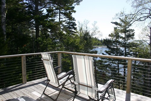 Tranquille chalet en bord de mer sur la baie de Wohoa
