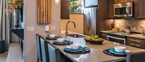 Coffee/tea maker, fridge, microwave, oven