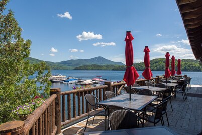 Walk to Mirror Lake and Main Street in this 3BR Lake Placid Retreat