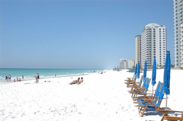On the beach, sun loungers