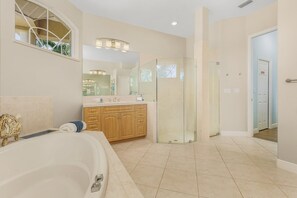Combined shower/tub, hair dryer, towels, soap