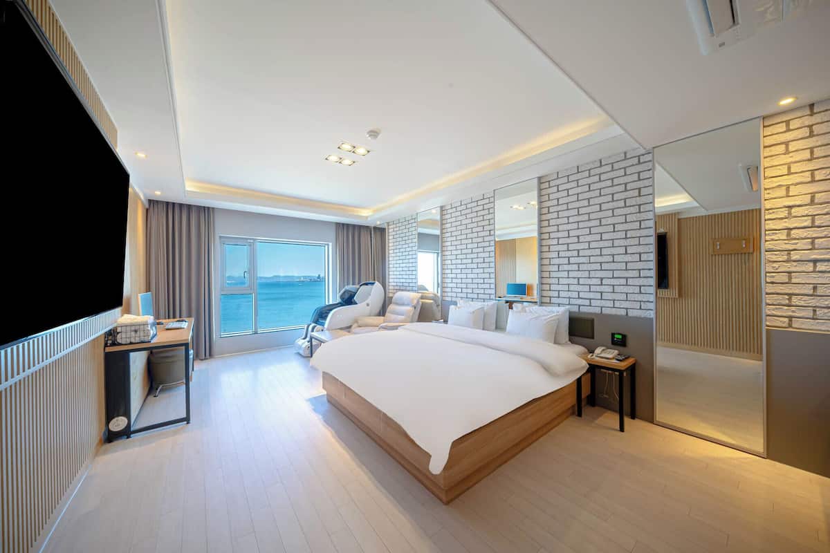 Habitación doble Premium, para no fumadores, vista al océano | Ropa de cama de alta calidad, edredón y decoración personalizada