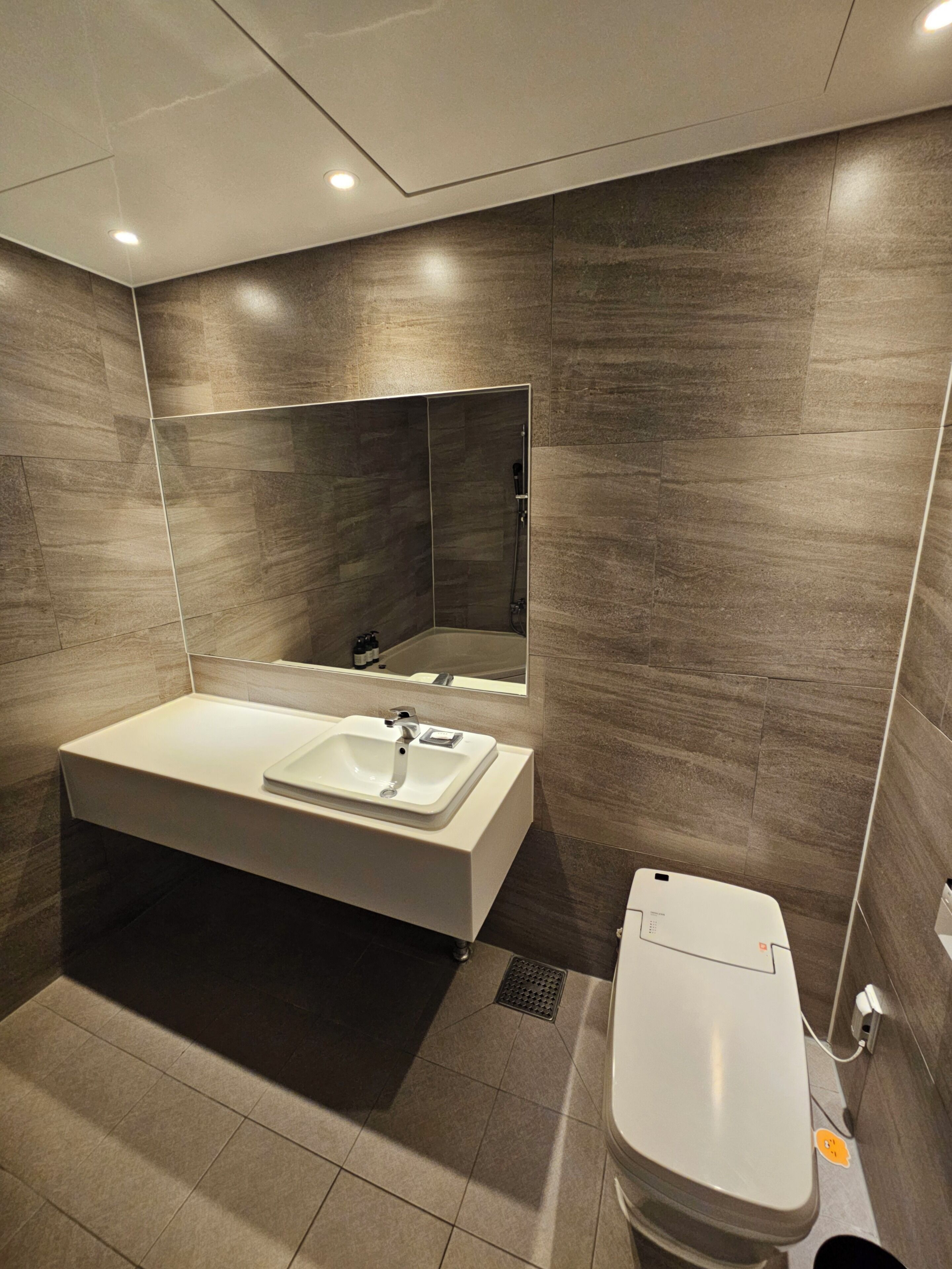 premium double room, non smoking, ocean view | bathroom | designer toiletries, hair dryer, bathrobes, slippers