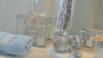 Hair dryer, towels, soap, toilet paper