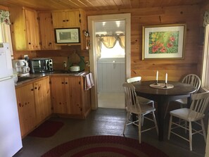 Kitchen/Living room & doorway into bathroom.