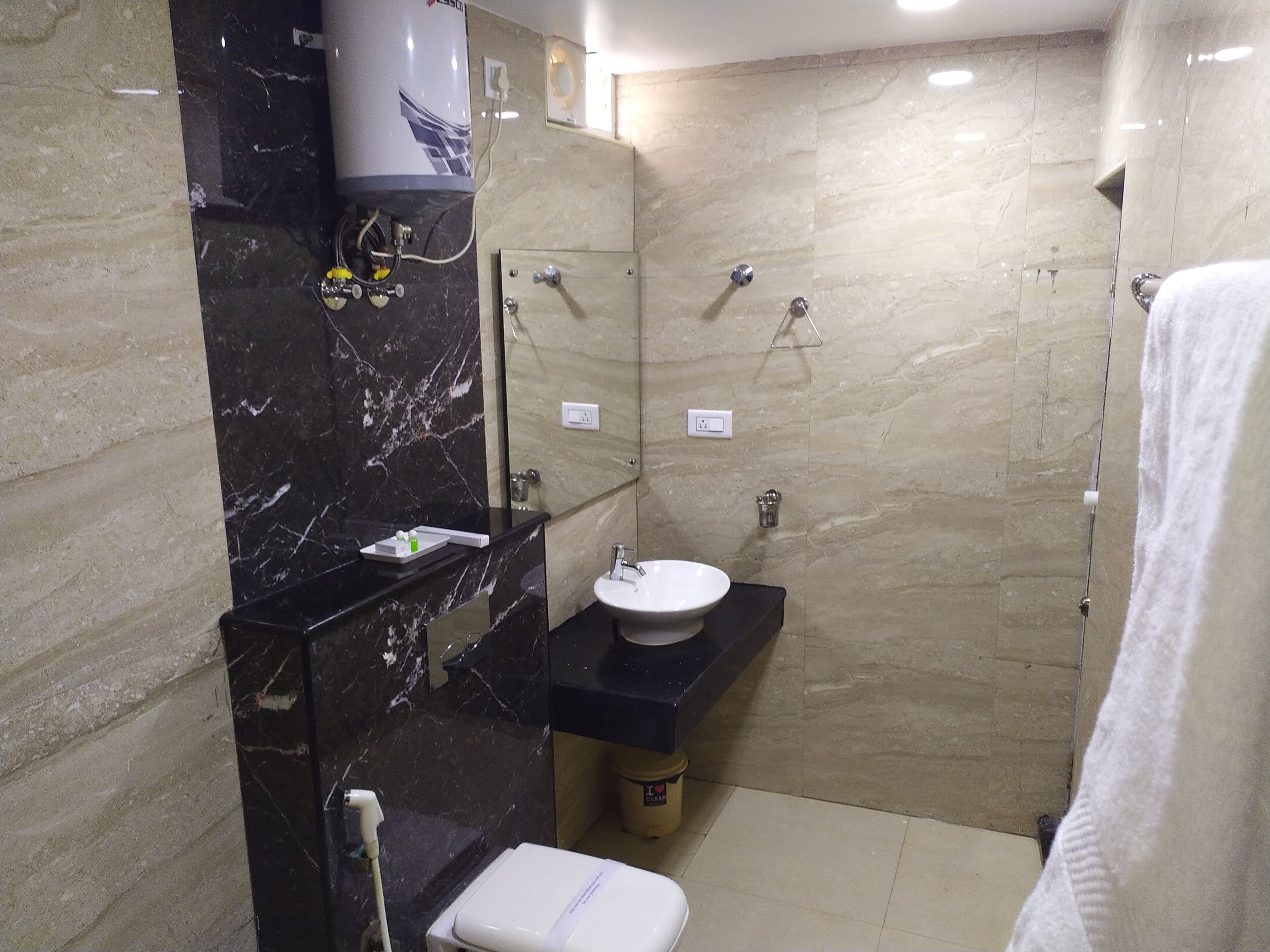Family Suite, 1 Bedroom, Non Smoking, City View | Bathroom | Shower, rainfall showerhead, free toiletries, slippers