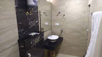 Family Suite, 1 Bedroom, Non Smoking, City View | Bathroom | Shower, rainfall showerhead, free toiletries, slippers