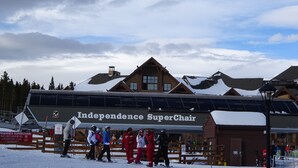 A ski resort building named 'Independence SuperChair' with a wooden exterior and a large glass facade. -  Grand Lodge On Peak 7, studio, February 27- March 6, 2027, ONLY, 3 night min (Breckenridge)