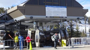 A ski lift station with a signboard providing instructions and safety information. -  Grand Lodge On Peak 7, studio, February 27- March 6, 2027, ONLY, 3 night min (Breckenridge)