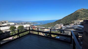 Traditional Quadruple Room, Multiple Beds, Non Smoking, Ocean View | Individually furnished, blackout drapes, free WiFi, bed sheets