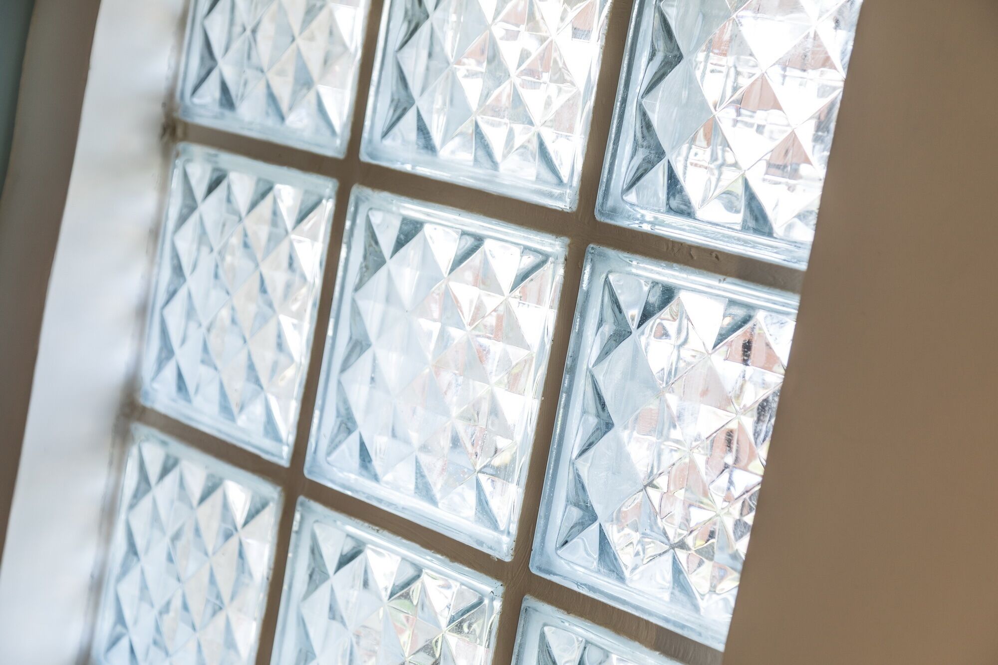 A window with a diamond-patterned grid design.