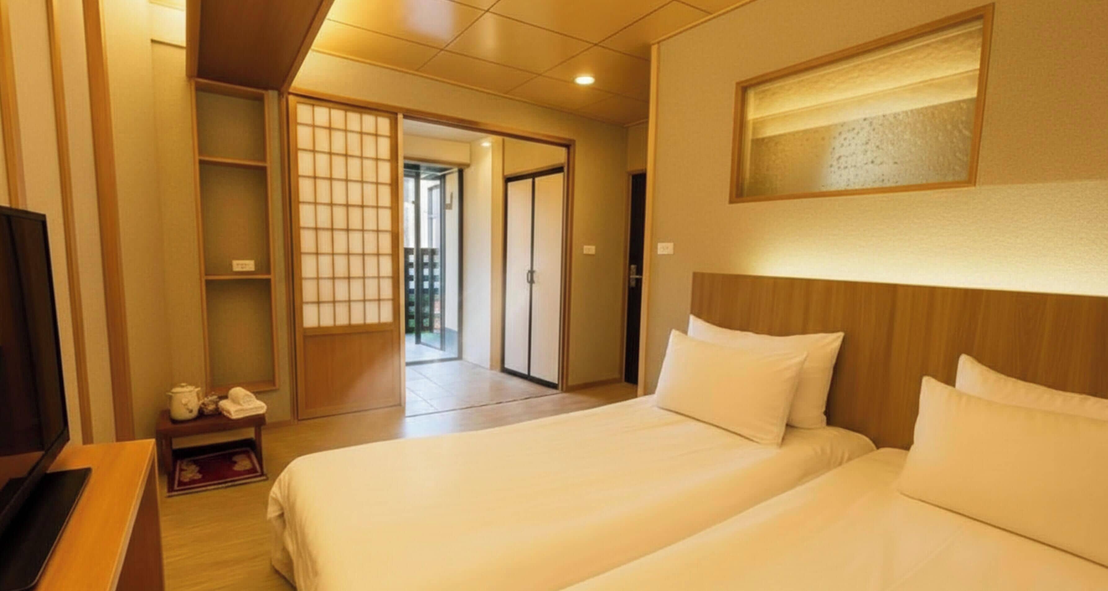 Quarto triplo elite | Individualmente mobiliados, cortinas blackout, Wi-Fi de cortesia