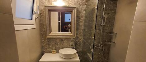 Bathtub, hair dryer, towels