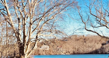 Charming 18th century cottage with its own beachfront on Scargo Lake near bay